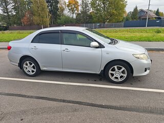 2008 Toyota Corolla AMT X (E140, E150), серебристый, 650000 рублей, вид 2