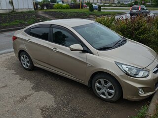 2011 Hyundai Solaris I, золотистый, 729000 рублей, вид 3