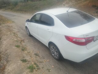 2014 Kia Rio III, белый, 720000 рублей, вид 5