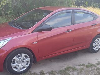 2011 Hyundai Solaris I, красный, 585000 рублей, вид 3