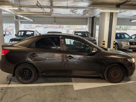 2010 Kia Cerato 5-speed II, коричневый, 620000 рублей, вид 5