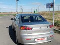 2014 Mitsubishi Lancer X Рестайлинг, серебристый, 870000 рублей - вид 2
