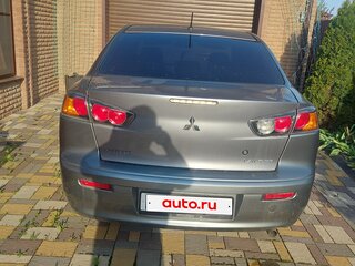 2012 Mitsubishi Lancer X Рестайлинг, серебристый, 1350000 рублей, вид 2
