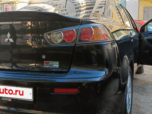 2010 Mitsubishi Lancer X, чёрный, 770000 рублей - вид 3