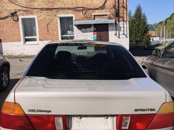 2000 Toyota Sprinter VIII (E110), серебристый - вид 3