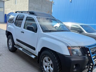 2011 Nissan Xterra II Рестайлинг, белый, 1400000 рублей, вид 1