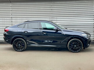 2022 BMW X6 40d III (G06), чёрный, 8900000 рублей, вид 4