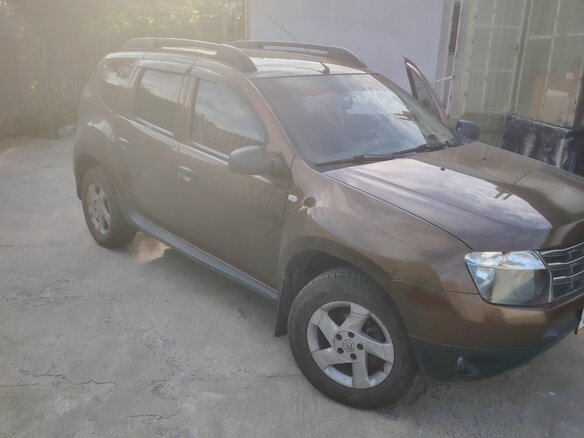 2014 Renault Duster I, коричневый, 900000 рублей - вид 4