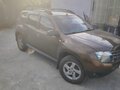 2014 Renault Duster I, коричневый, 900000 рублей - вид 4