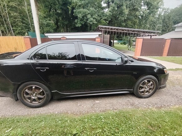 2008 Mitsubishi Lancer X, чёрный - вид 3