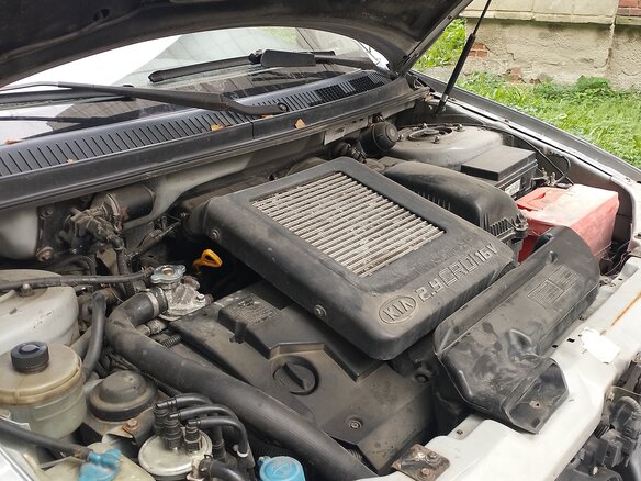 2005 Kia Carnival I Рестайлинг, серебристый, 480000 рублей - вид 6