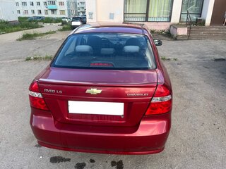 2011 Chevrolet Aveo I Рестайлинг, красный, 550000 рублей, вид 5