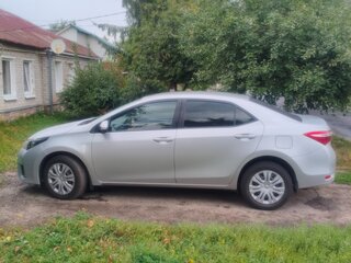 2014 Toyota Corolla XI (E160, E170, E180), серый, 950000 рублей, вид 1