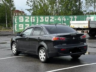 2013 Mitsubishi Lancer X Рестайлинг, чёрный, 860000 рублей, вид 2