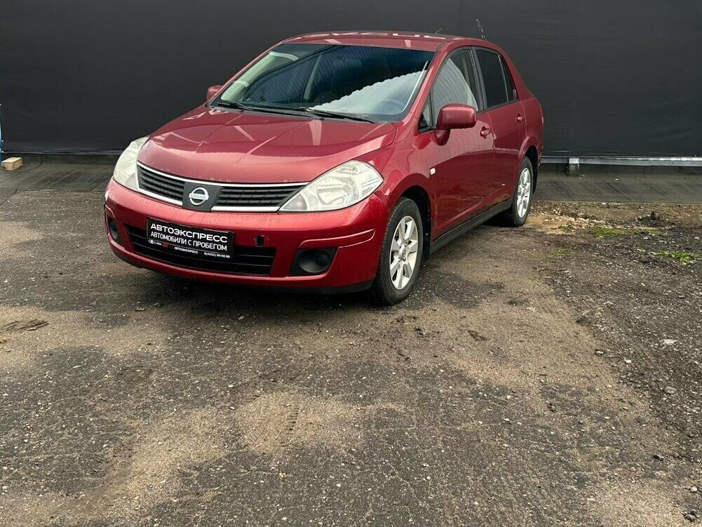 Открыть фотографии: Nissan Tiida I