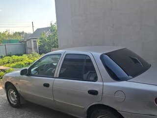 1998 Kia Sephia I Рестайлинг, серебристый, 125000 рублей, вид 3