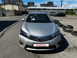 2013 Toyota Corolla XI (E160, E170, E180), серебристый, 900000 рублей, вид 3