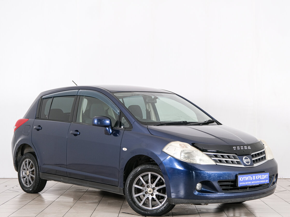 Открыть фотографии: Nissan Tiida I