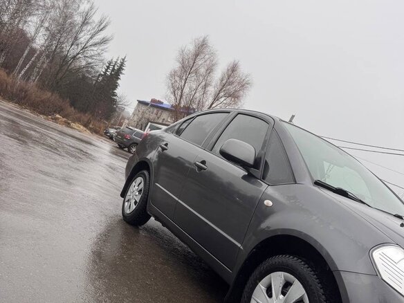 2010 Suzuki SX4 I (Classic) Рестайлинг, серый, 800000 рублей - вид 4