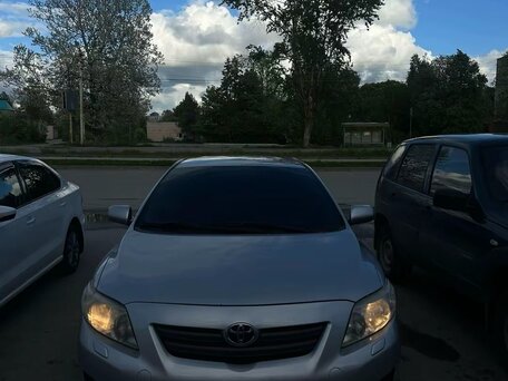 2008 Toyota Corolla X (E140, E150), серебристый, 680000 рублей, вид 3