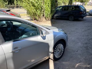2009 Ford Focus II Рестайлинг, серебристый, 530000 рублей, вид 4