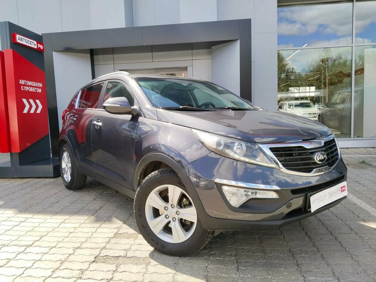 Открыть фотографии: Kia Sportage III