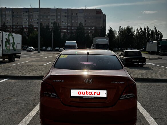2014 Hyundai Solaris I Рестайлинг, оранжевый, 950000 рублей - вид 5