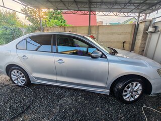 2012 Volkswagen Jetta VI, серебристый, 949999 рублей, вид 4