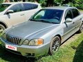 2003 Kia Magentis I Рестайлинг, серебристый - вид 1