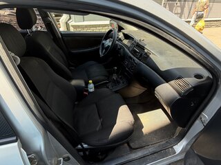 2004 Toyota Corolla IX (E120, E130), серебристый, 350000 рублей, вид 1