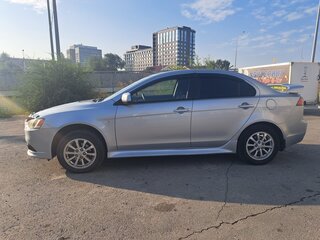2012 Mitsubishi Lancer X Рестайлинг, серебристый, 895000 рублей, вид 4