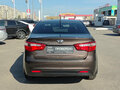 2014 Kia Rio 6-speed III, коричневый, 825000 рублей - вид 5
