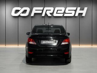 2011 Hyundai Solaris I, чёрный, 698000 рублей, вид 4