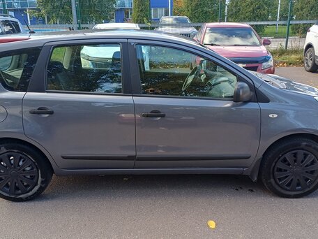 2010 Nissan Note I Рестайлинг, серый, 690000 рублей, вид 4