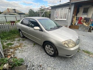 2004 Toyota Corolla IX (E120, E130) Рестайлинг, серебристый, 650000 рублей, вид 2