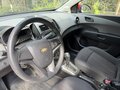 2012 Chevrolet Aveo II, красный, 750000 рублей - вид 6