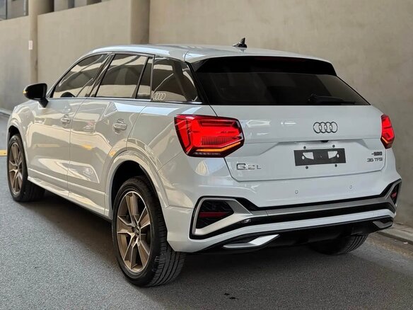 2022 Audi Q2 L 35 TFSI I Рестайлинг, белый, 2000000 рублей - вид 2