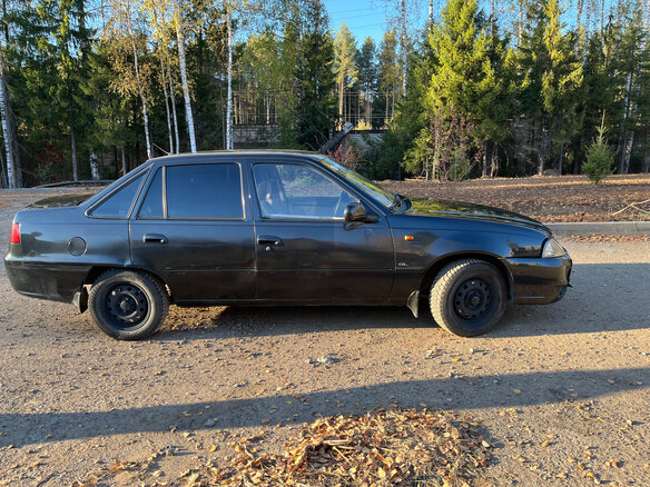 2012 Daewoo Nexia I Рестайлинг, чёрный, 124990 рублей - вид 2