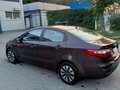 2014 Kia Rio 6-speed III, коричневый, 700000 рублей - вид 5