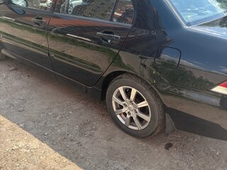 2006 Mitsubishi Lancer IX Рестайлинг, чёрный, 380000 рублей, вид 2