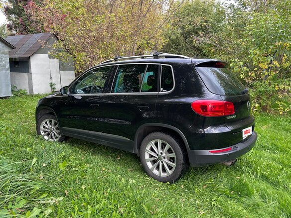 2011 Volkswagen Tiguan I Рестайлинг, чёрный, 1250000 рублей - вид 3