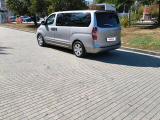 2010 Hyundai Grand Starex I, серый, 1750000 рублей, вид 5