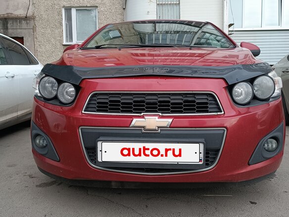 2012 Chevrolet Aveo II, красный, 650000 рублей
