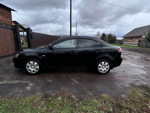 2008 Mitsubishi Lancer X, чёрный, 570000 рублей - вид 7