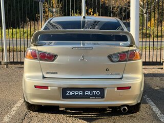 2010 Mitsubishi Lancer X, бежевый, 879000 рублей, вид 5