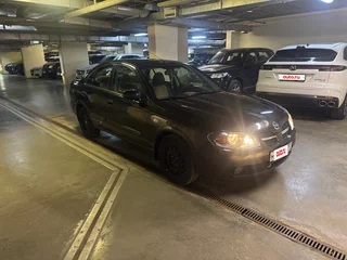 2005 Nissan Almera II (N16) Рестайлинг, чёрный, 700000 рублей, вид 2