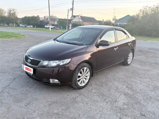 2011 Kia Cerato 6-speed II, пурпурный, 980000 рублей, вид 1