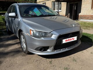 2011 Mitsubishi Lancer X Рестайлинг, белый, 419000 рублей, вид 3