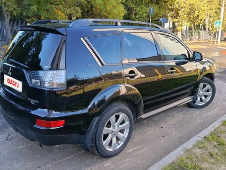 2011 Mitsubishi Outlander II Рестайлинг, чёрный, 1150000 рублей, вид 4