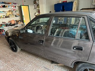 2002 Daewoo Nexia I, коричневый, 700000 рублей, вид 4